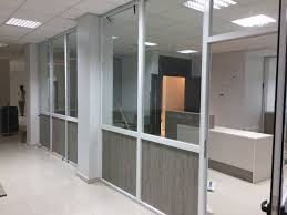 A silver aluminum and glass partition