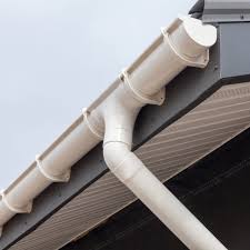 A gutter on the edge of a roof