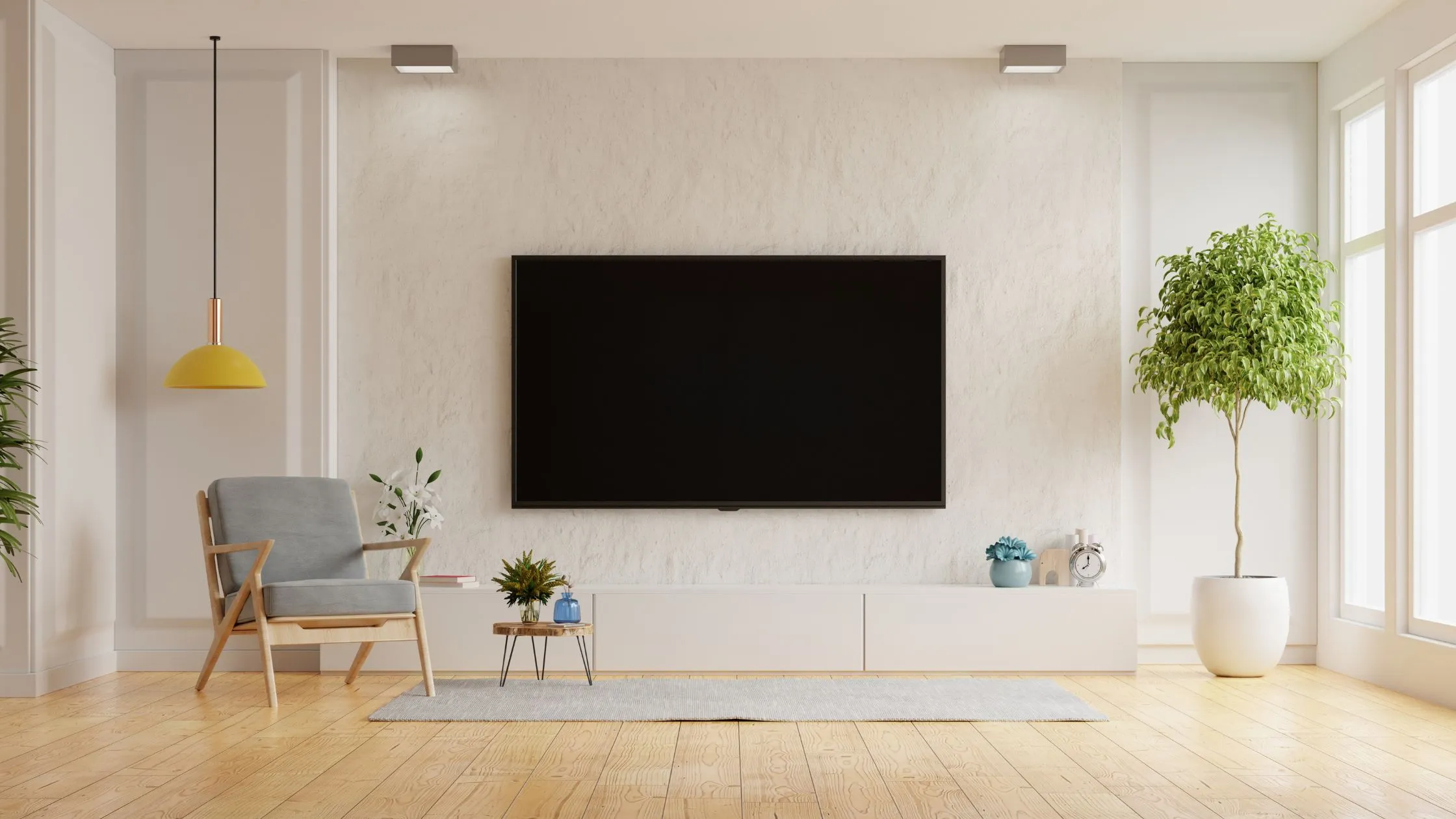 A TV screen hanging on the interior wall