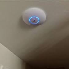 access point on an apartment interior ceiling 