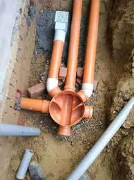 Plumbing pipes in a hole