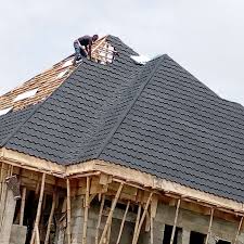 Two technicians fixing a roof