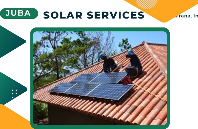 Two solar technicians on the roof fixing solar panels