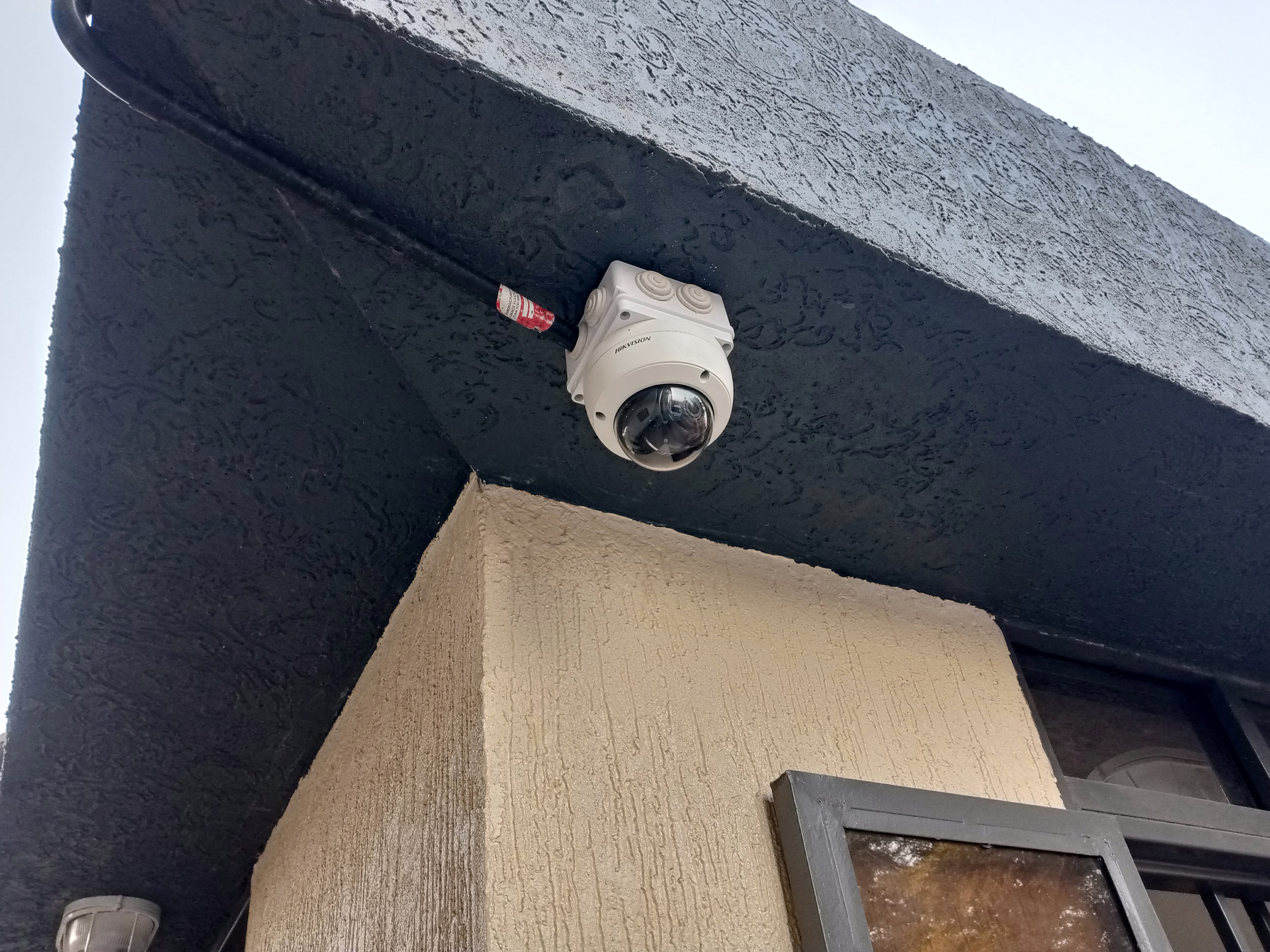 A hikvision dome camera covering a compound and gate of a real estate in Juba, South Sudan