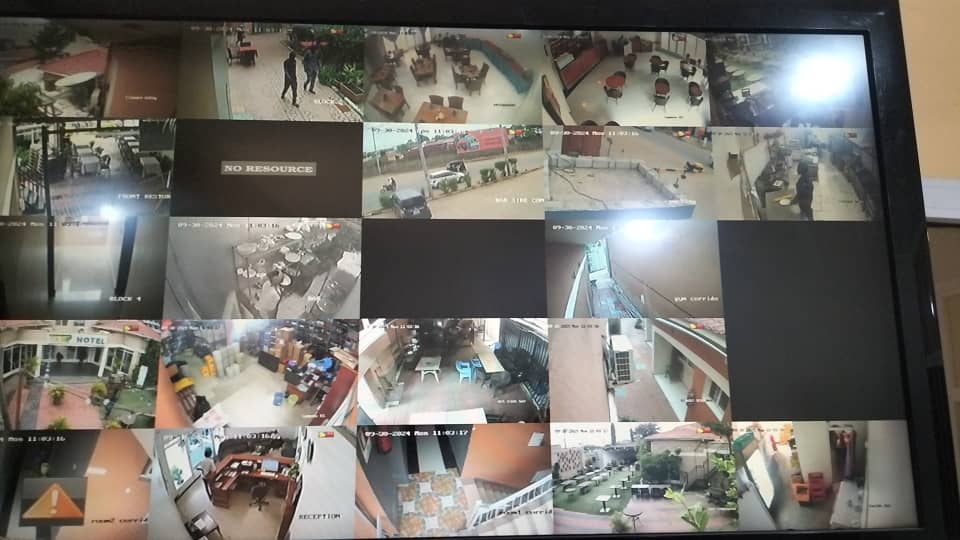 A TV screen with 14 live view from CCCTV cameras in an office building in Juba, South Sudan.
