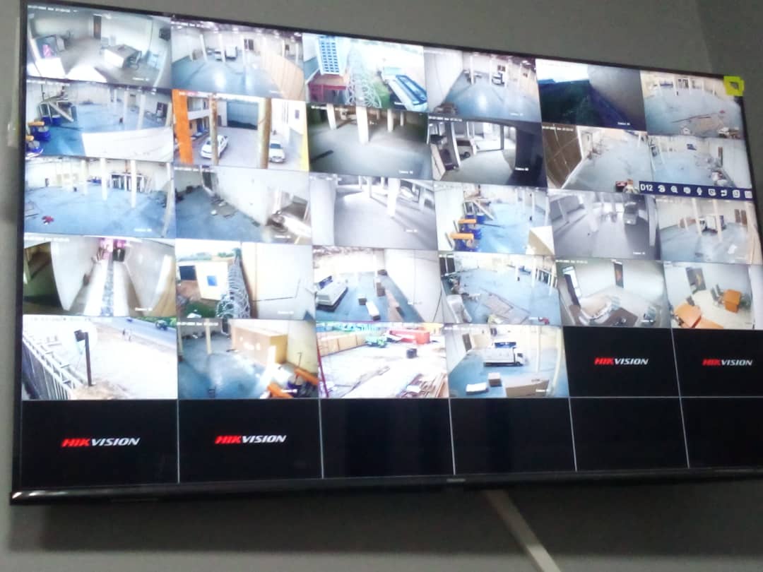 A TV screen with 33 live view from CCTV cameras in a Paint factory in Juba, South Sudan